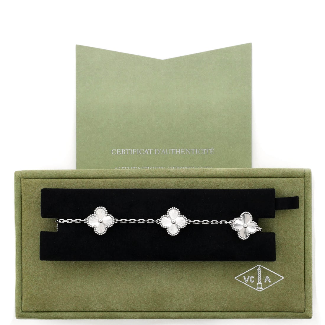 Van Cleef & Arpels Van Cleef & Arpels Vintage Alhambra 5 Motifs Bracelet Guilloche 18K White Gold: Warning: may cause instant outfit upgrades: Van Cleef & Arpels Van Cleef & Arpels Vintage Alhambra 5 Motifs Bracelet Guilloche 18K White Gold in White Gold. Approx. dimensions: 7.5 x 14.9 x 0.0 inches