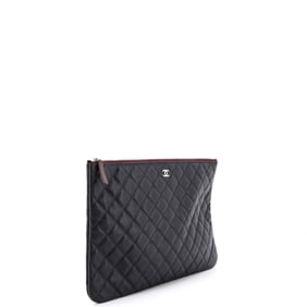 Chanel Chanel O Case Clutch Quilted Caviar Large