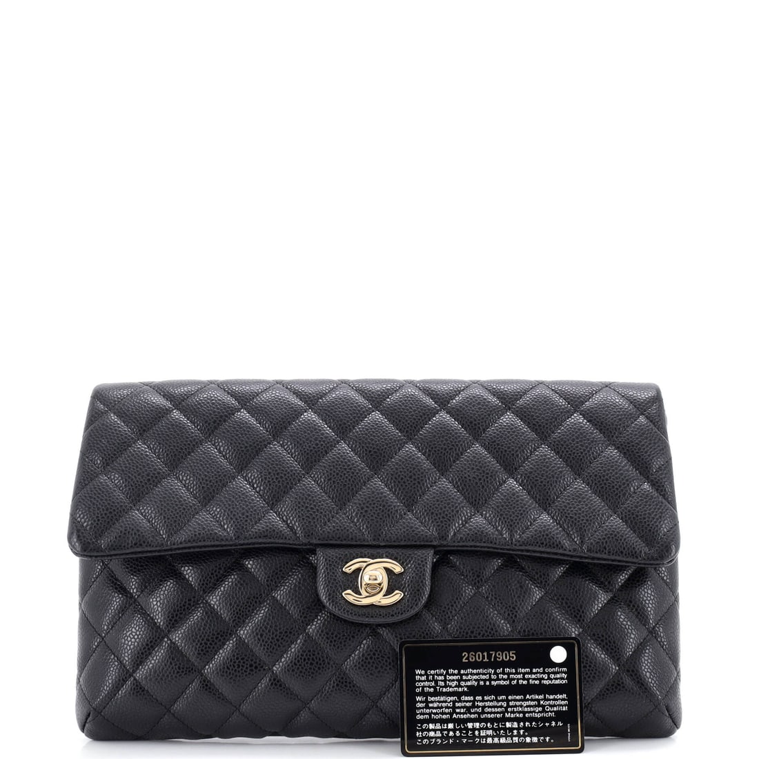 Chanel Classic Flap Clutch Quilted Caviar: From the ateliers of Chanel, this is no ordinary handbag it's a marvel. Featuring the iconic Chanel Classic Flap Clutch Quilted Caviar, its a testament to refined rebellion. The rich black palette evo