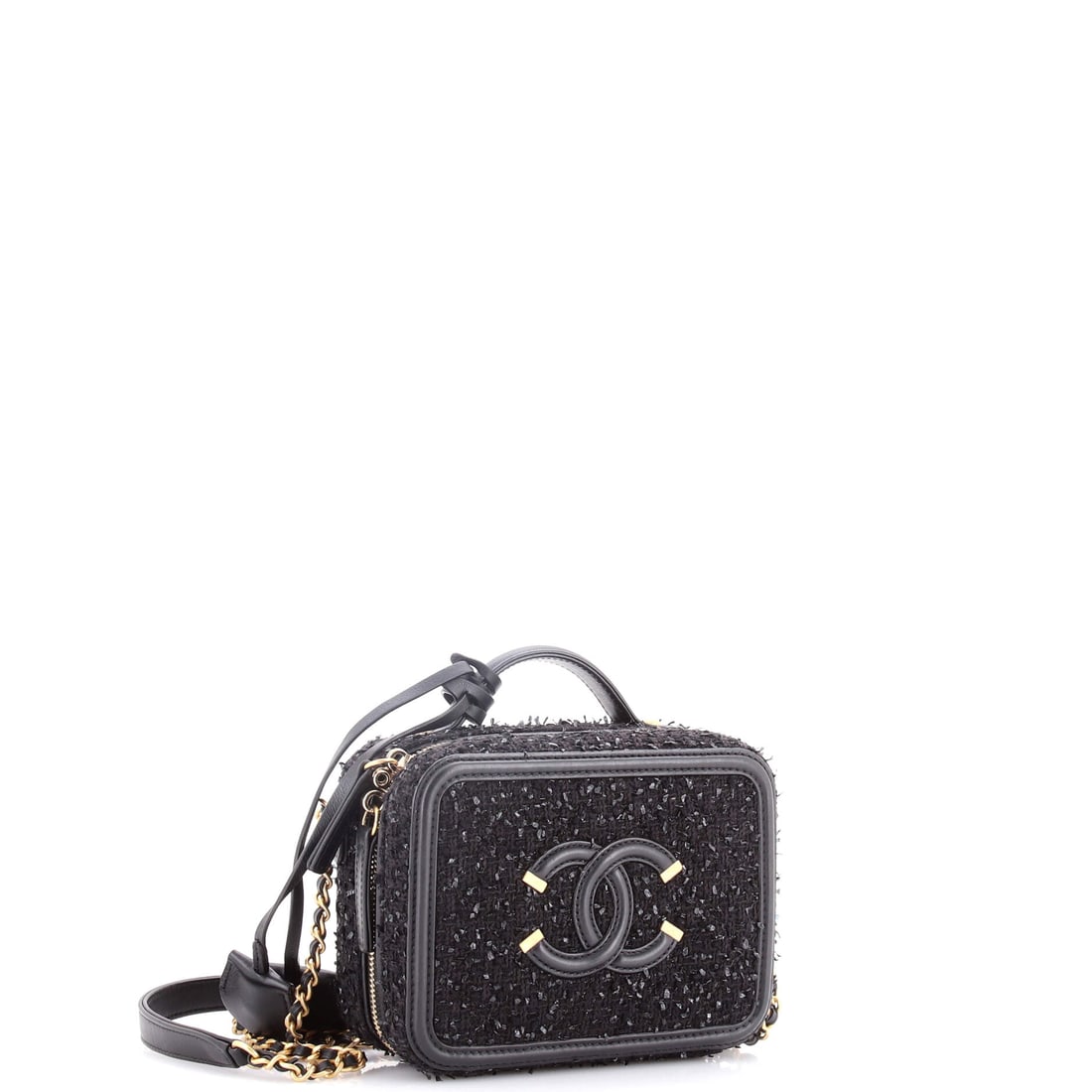 Chanel Filigree Vanity Case Quilted Tweed Small: Luxury meets legend in this show-stopping Chanel piece, ready for your next grand entrance. Featuring the iconic Chanel Filigree Vanity Case Quilted Tweed Small, its a testament to refined rebellion.