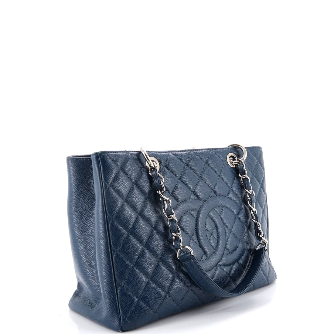 Chanel Grand Shopping Tote Quilted Caviar: From the ateliers of Chanel, this is no ordinary handbag it's a marvel. Featuring the iconic Chanel Grand Shopping Tote Quilted Caviar, its a testament to refined rebellion. The rich blue palette evok