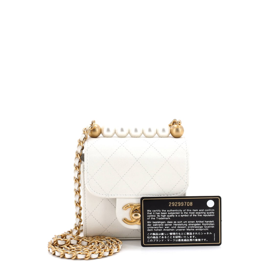 Chanel Chic Pearls Flap Clutch with Chain Quilted Goatskin Mini: From the ateliers of Chanel, this is no ordinary handbag it's a marvel. Featuring the iconic Chanel Chic Pearls Flap Clutch with Chain Quilted Goatskin Mini, its a testament to refined rebellion. The