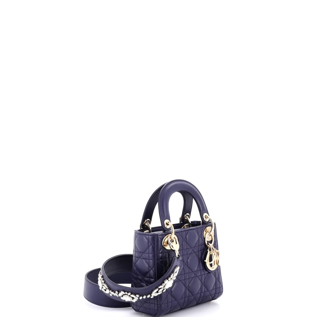 Christian Dior Lady Dior Bag Cannage Quilt Lambskin with Crystal Detail Mini: Christian Dior delivers iconic form and fearless flair with this stunning creation. Featuring the iconic Christian Dior Lady Dior Bag Cannage Quilt Lambskin with Crystal Detail Mini, its a testament t