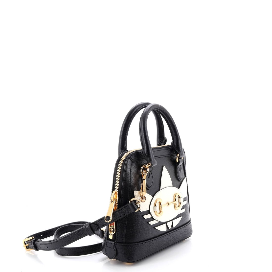 Gucci x Adidas Horsebit 1955 Top Handle Bag Leather with Applique Mini: A signature silhouette from Gucci, meticulously crafted to enchant collectors and connoisseurs alike. Featuring the iconic Gucci x Adidas Horsebit 1955 Top Handle Bag Leather with Applique Mini, its a