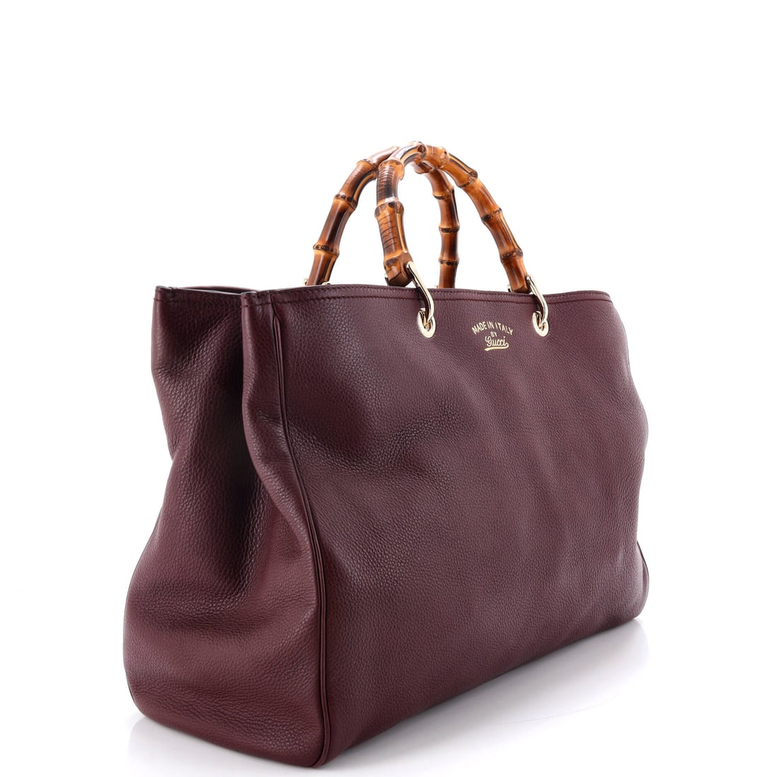 Gucci Bamboo Shopper Tote Leather Large: Luxury meets legend in this show-stopping Gucci piece, ready for your next grand entrance. Featuring the iconic Gucci Bamboo Shopper Tote Leather Large, its a testament to refined rebellion. The rich