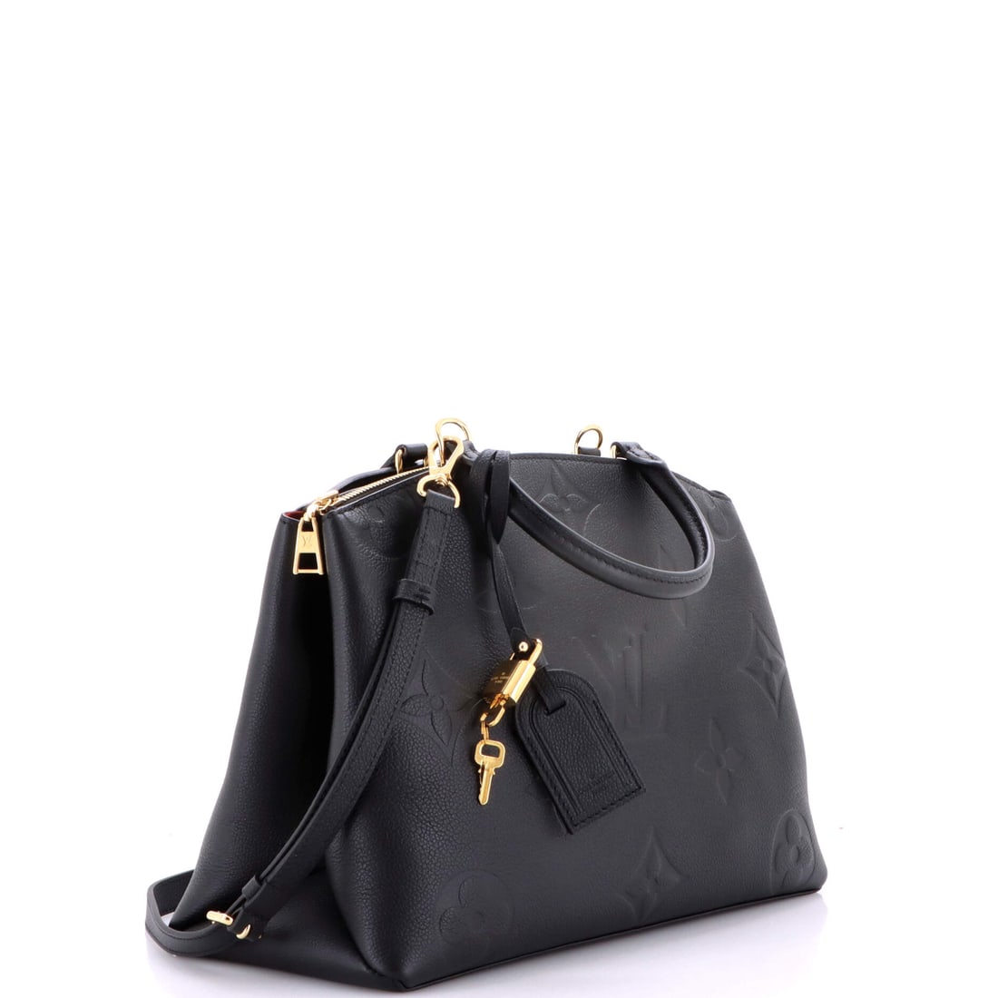 Louis Vuitton Grand Palais Handbag Monogram Empreinte Giant: A signature silhouette from Louis Vuitton, meticulously crafted to enchant collectors and connoisseurs alike. Featuring the iconic Louis Vuitton Grand Palais Handbag Monogram Empreinte Giant, its a te