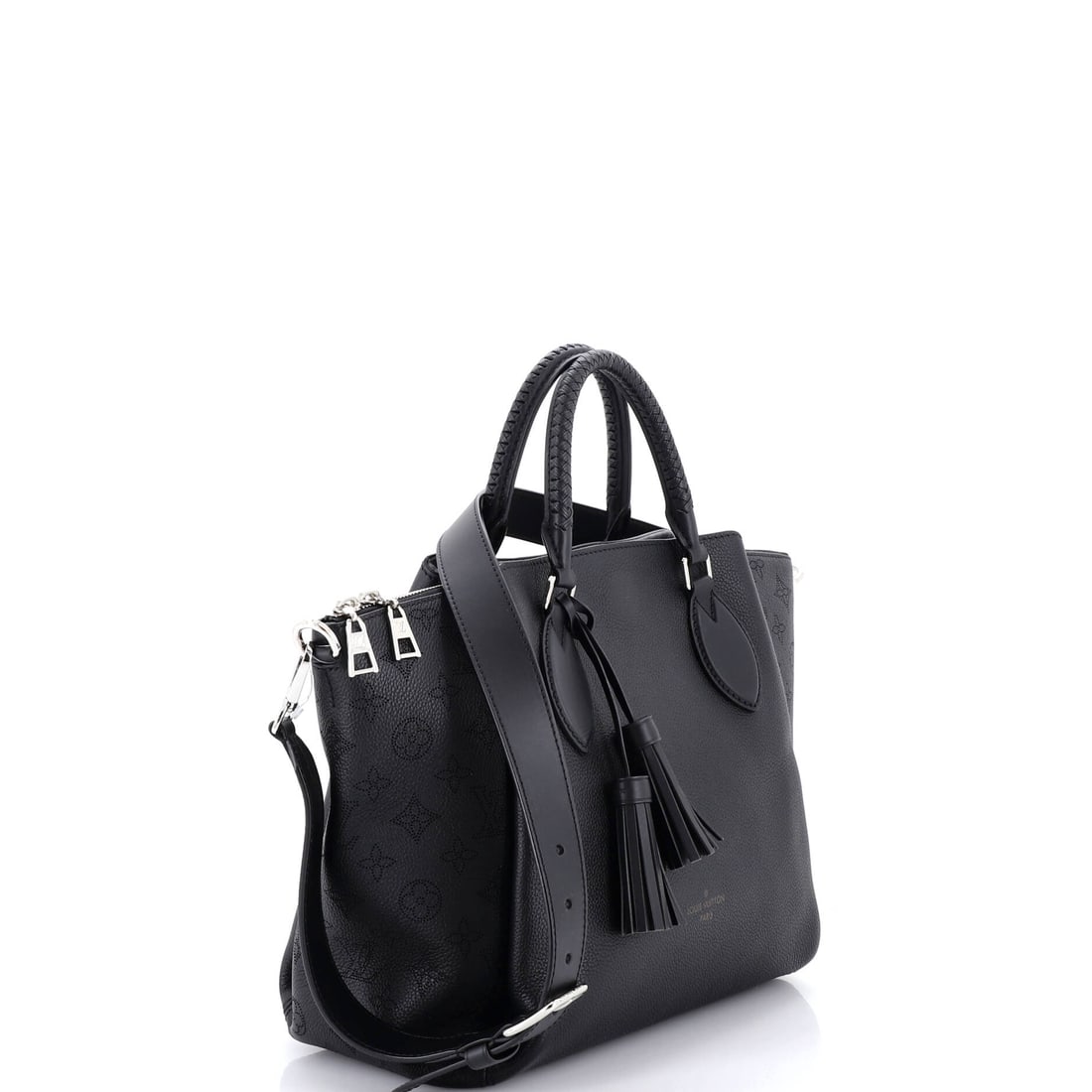 Louis Vuitton Haumea Handbag Mahina Leather: From the ateliers of Louis Vuitton, this is no ordinary handbag it's a marvel. Featuring the iconic Louis Vuitton Haumea Handbag Mahina Leather, its a testament to refined rebellion. The rich black pa