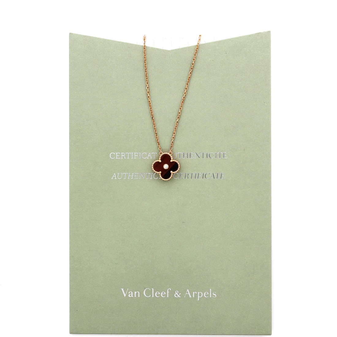 Van Cleef & Arpels Vintage Alhambra Pendant Necklace Limited Edition 18K Rose Gold and Bull's Eye: A signature silhouette from Van Cleef & Arpels, meticulously crafted to enchant collectors and connoisseurs alike. Featuring the iconic Van Cleef & Arpels Vintage Alhambra Pendant Necklace Limited Edi