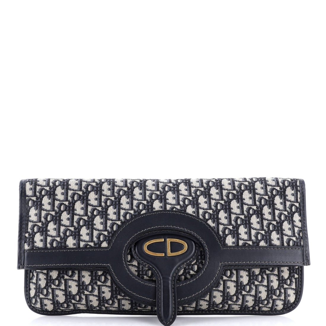 Christian Dior Fold Over Clutch: Effortlessly self-assured, the Christian Dior Fold Over Clutch refuses to be forgettable. It was clearly designed for someone who understands impact. Proof that good taste rarely needs to raise its vo