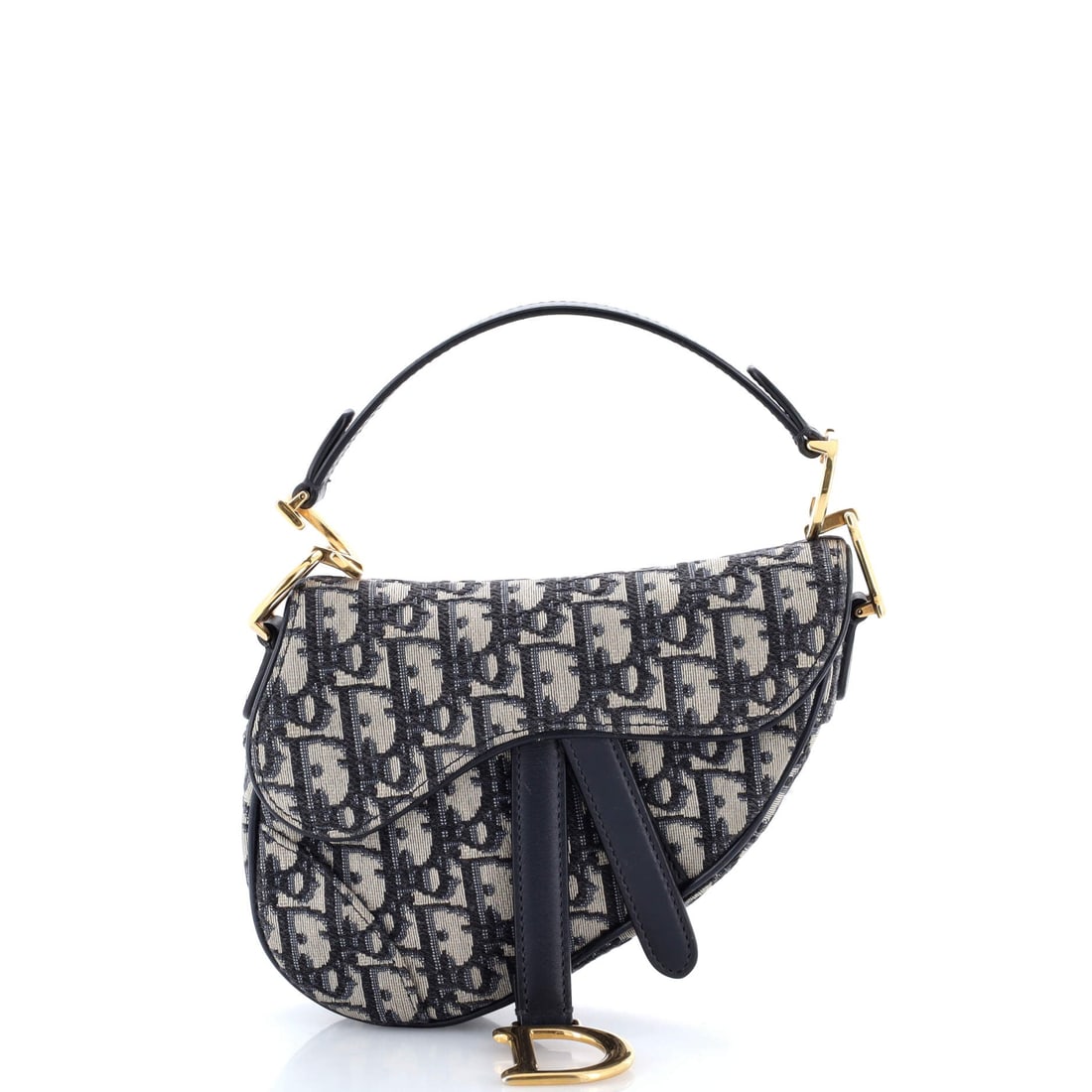 Christian Dior Saddle Handbag: Equal parts polish and personality, the Christian Dior Saddle Handbag refuses to be forgettable. It has that rare ability to feel timeless and entirely current at once. It is the sort of piece that do