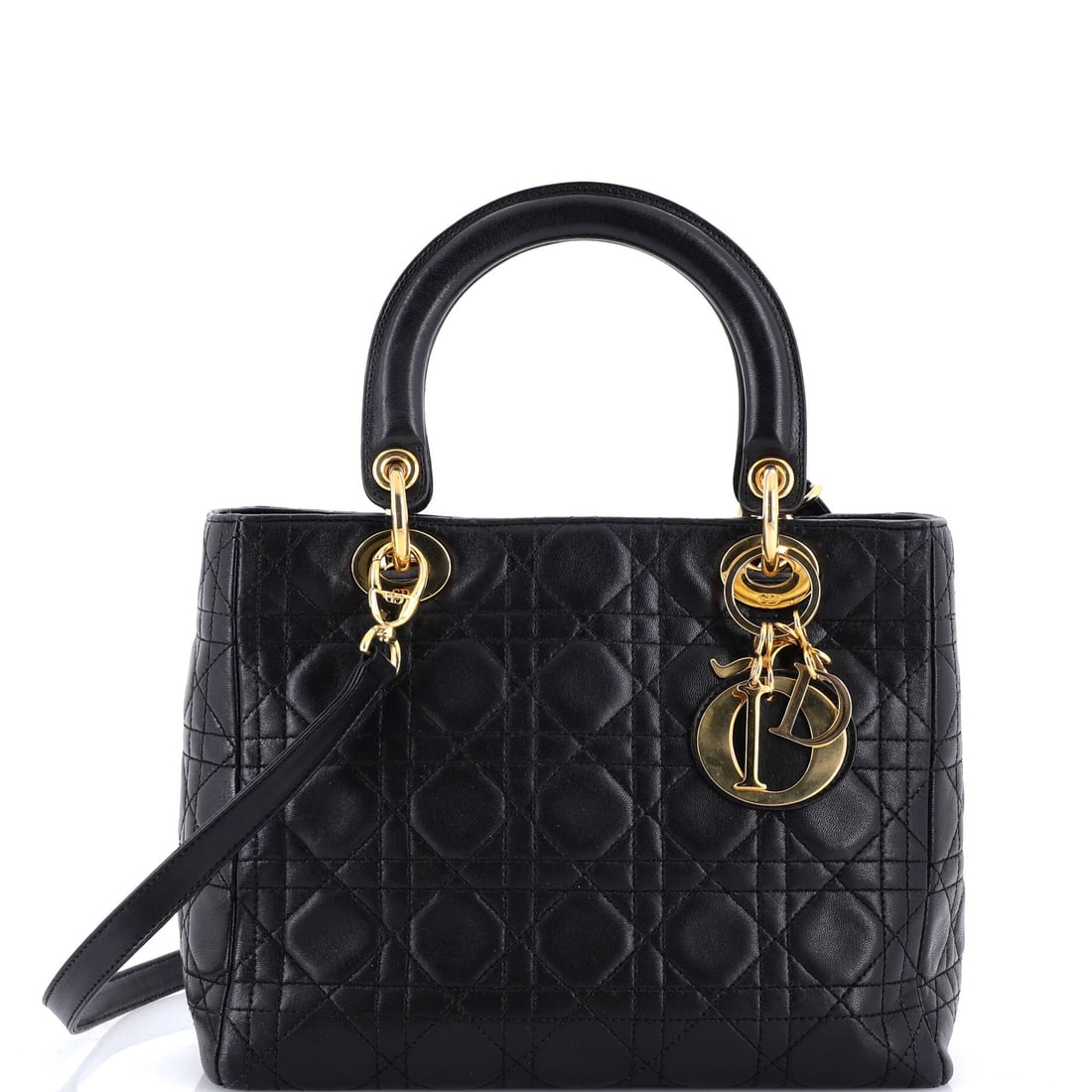 Christian Dior Vintage Lady Dior Bag: The Christian Dior Vintage Lady Dior Bag was clearly designed for someone who understands impact. Charming, composed, and entirely in on the joke.