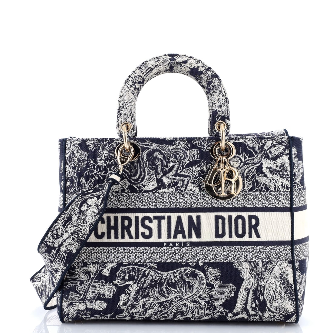 Christian Dior Lady D-Lite Bag: Some pieces simply exist; the Christian Dior Lady D-Lite Bag refuses to be forgettable. It proves that refinement and personality are not mutually exclusive. Understated from afar, unforgettable up cl