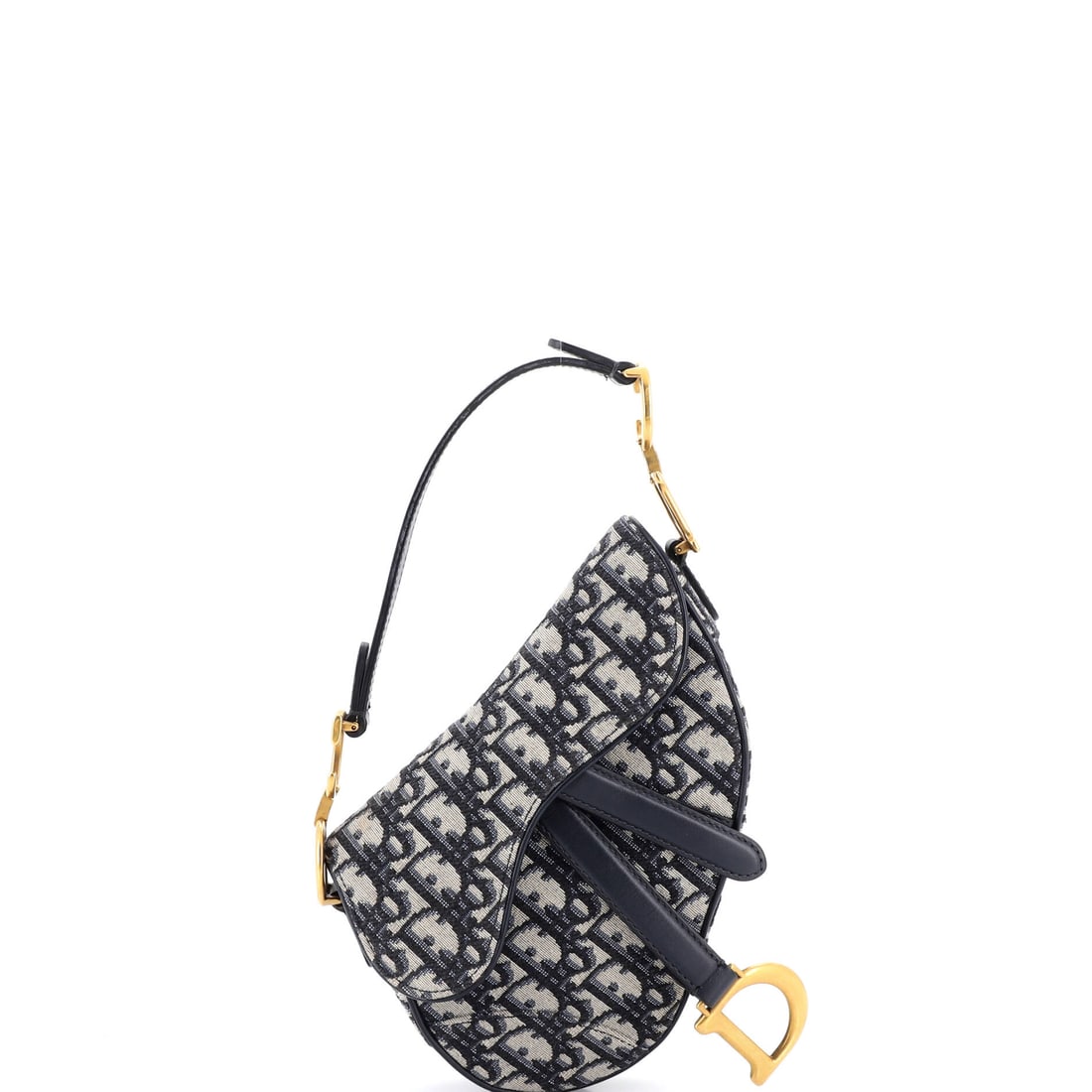 Christian Dior Saddle Handbag: Not one to blend into the background, the Christian Dior Saddle Handbag refuses to be forgettable. It proves that refinement and personality are not mutually exclusive. Equal parts classic and cleverl