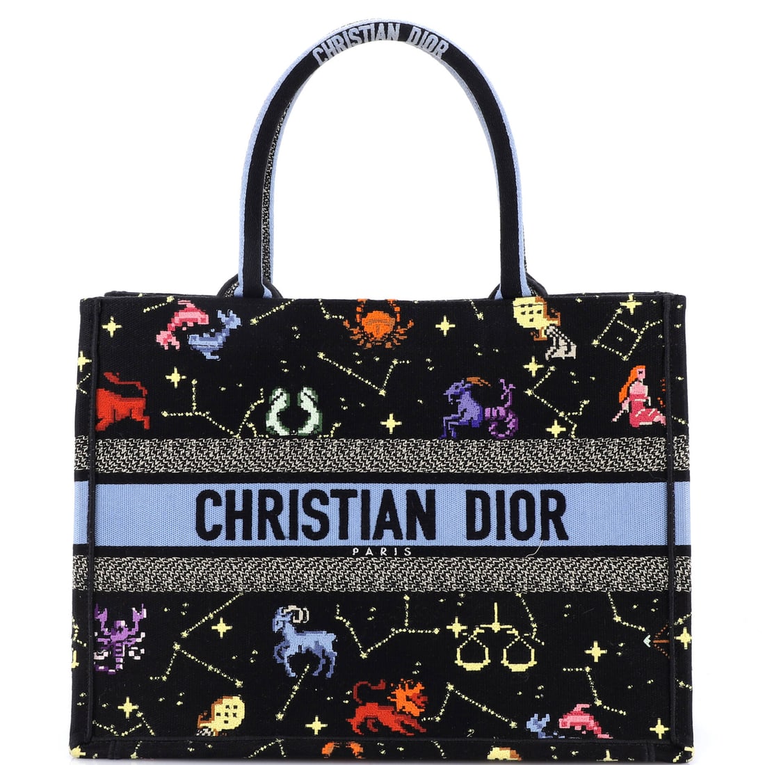 Christian Dior Book Tote: Not one to blend into the background, the Christian Dior Book Tote has that rare ability to feel timeless and entirely current at once. Understated from afar, unforgettable up close.