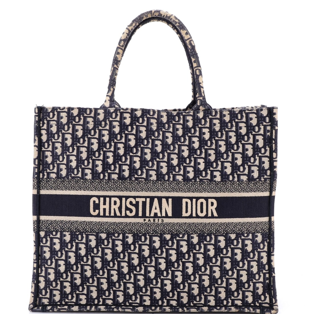 Christian Dior Book Tote: If confidence were an accessory, it would be the Christian Dior Book Tote proves that refinement and personality are not mutually exclusive. It does not chase attention; it collects it.