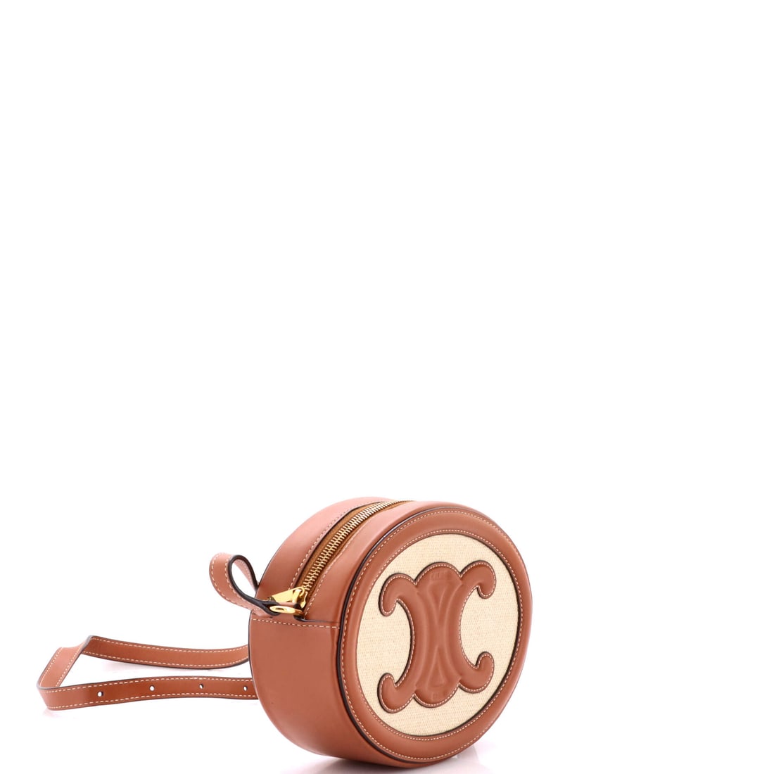 Celine Triomphe Oval Crossbody Bag Canvas and Leather: Lot 91 channels the kind of quiet icon status Celine does best. Offered here as Celine Celine Triomphe Oval Crossbody Bag Canvas and Leather, finished in Neutral; approx. 8.0 W x 6.0 H; 2.5 D. Think