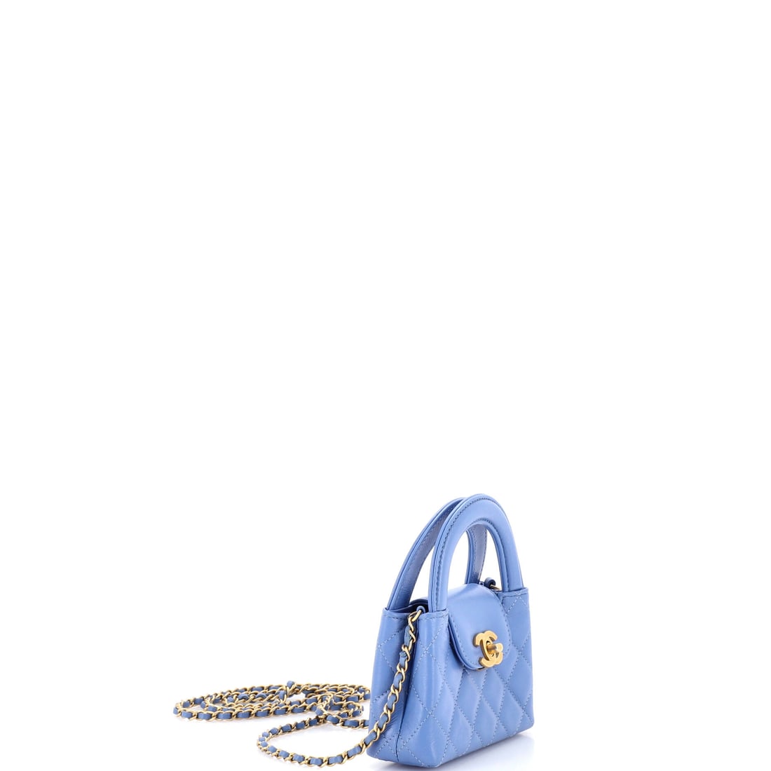 Chanel Kelly Top Handle Shopping Bag Quilted Shiny Aged Calfskin Nano: Lot 122 is made for the days you want your outfit to do the talking. Offered here as Chanel Chanel Kelly Top Handle Shopping Bag Quilted Shiny Aged Calfskin Nano, finished in Blue; approx. 4.5 W x 3.5