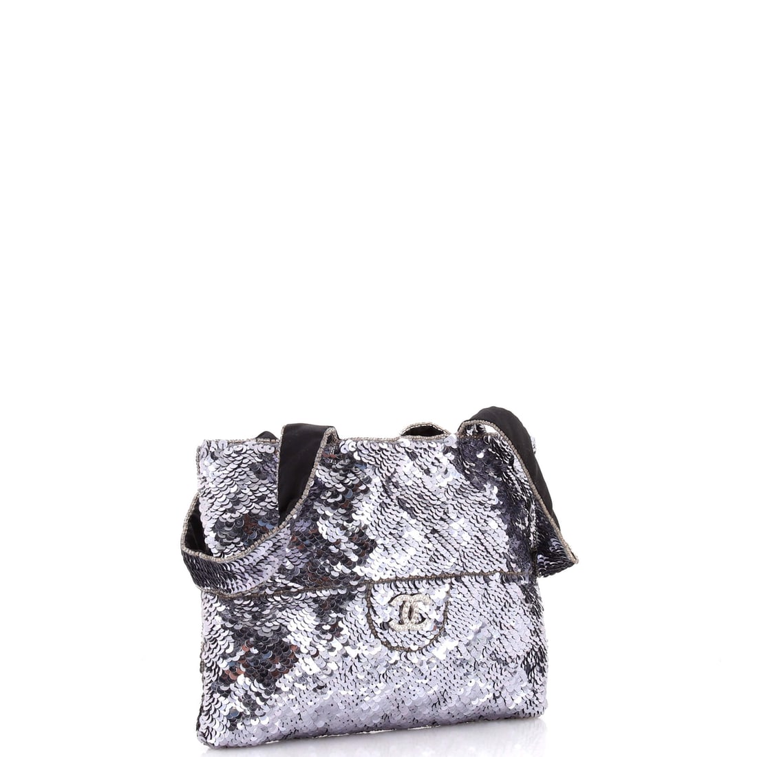 Chanel Trompe L'Oeil CC Evening Bag Sequins: Lot 176 channels the kind of quiet icon status Chanel does best. Offered here as Chanel Chanel Trompe L'Oeil CC Evening Bag Sequins, finished in Silver; approx. 9.0 W x 7.0 H; 1.0 D. Think of it as