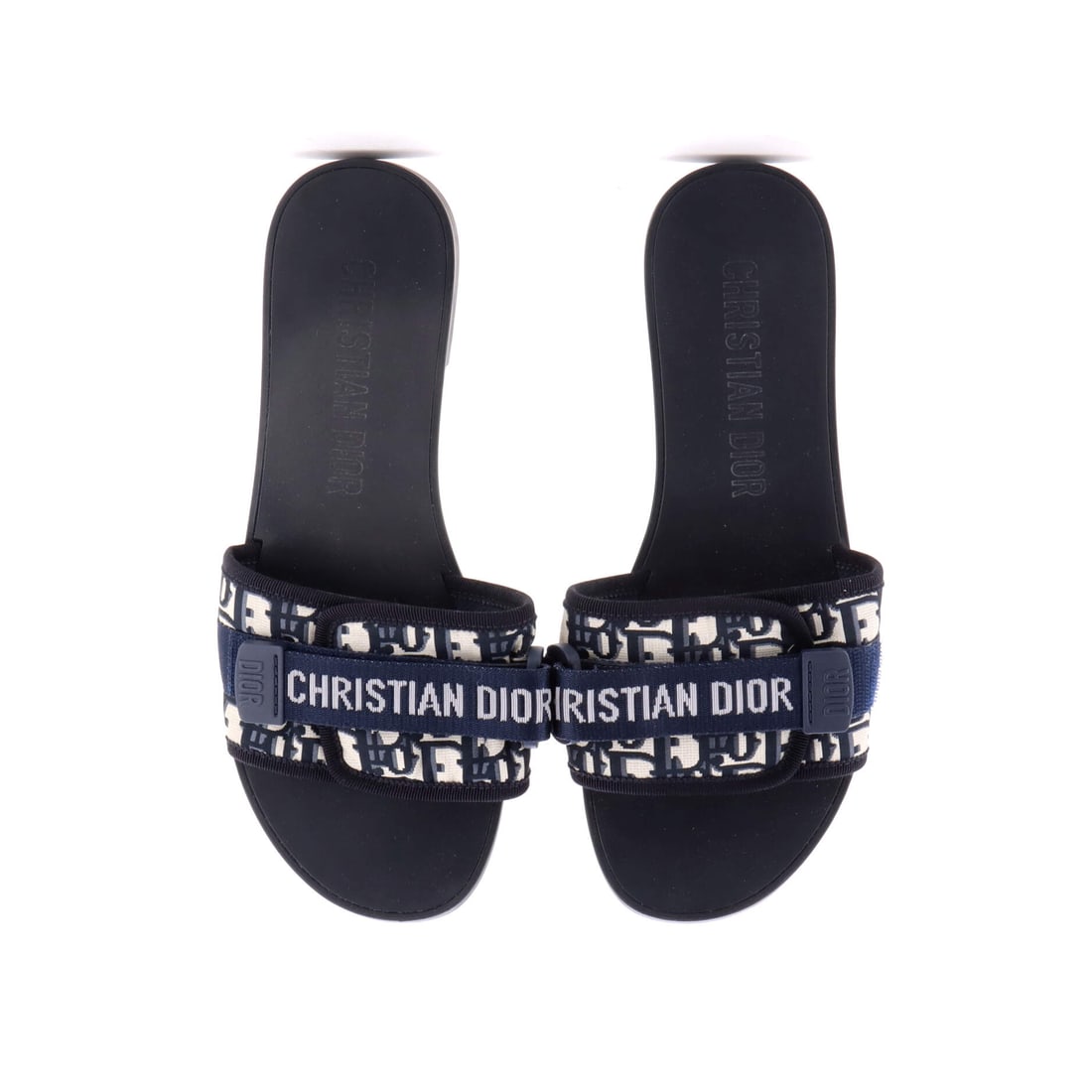 Christian Dior Women's Dio(r)evolution Slide Sandals Oblique Fabric: Lot 250 is a smart buy-now-keep-forever kind of piece. Offered here as Christian Dior Christian Dior Women's Dio(r)evolution Slide Sandals Oblique Fabric, finished in Blue. Equal parts practical and