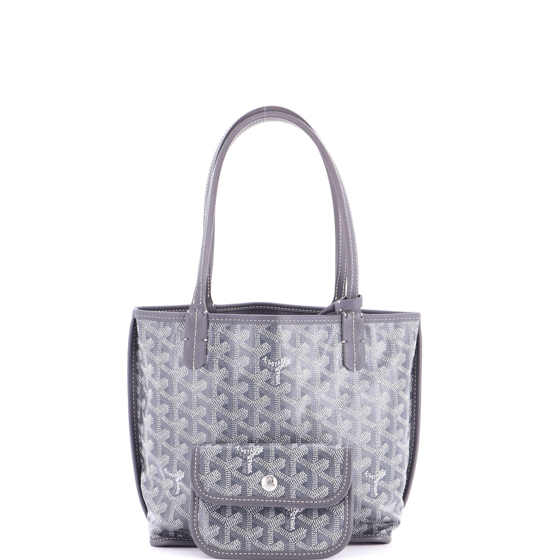 Goyard Anjou Reversible Tote Coated Canvas Mini: Lot 283 gets the proportions exactly right - confident, clean, and considered. Offered here as Goyard Goyard Anjou Reversible Tote Coated Canvas Mini, finished in Gray, White; approx. 8.0 W x 8.0 H; 3