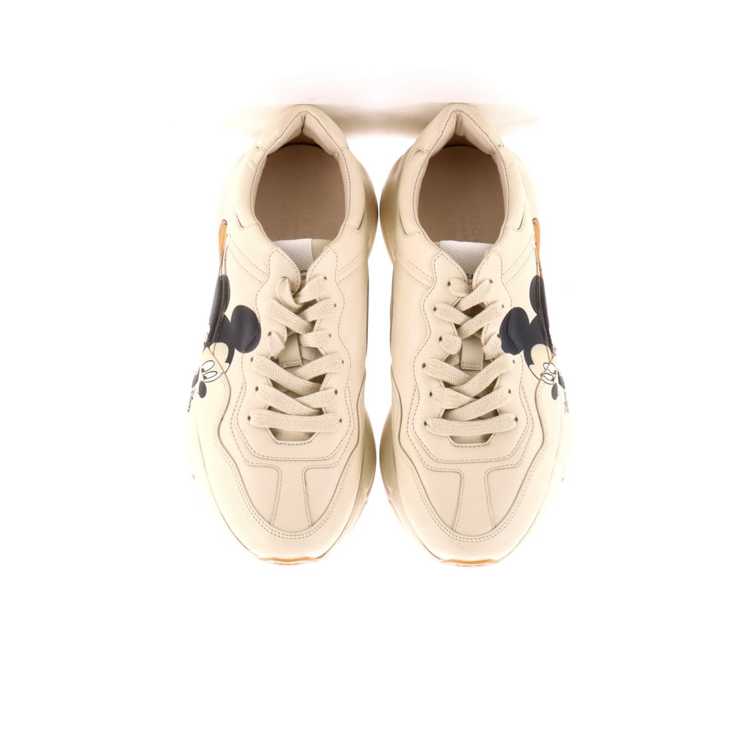 Gucci Disney Rhyton Sneakers Printed Leather: Lot 406 channels the kind of quiet icon status Gucci does best. Offered here as Gucci Gucci Disney Rhyton Sneakers Printed Leather, finished in Neutral, Print. Think of it as Gucci in one perfectly