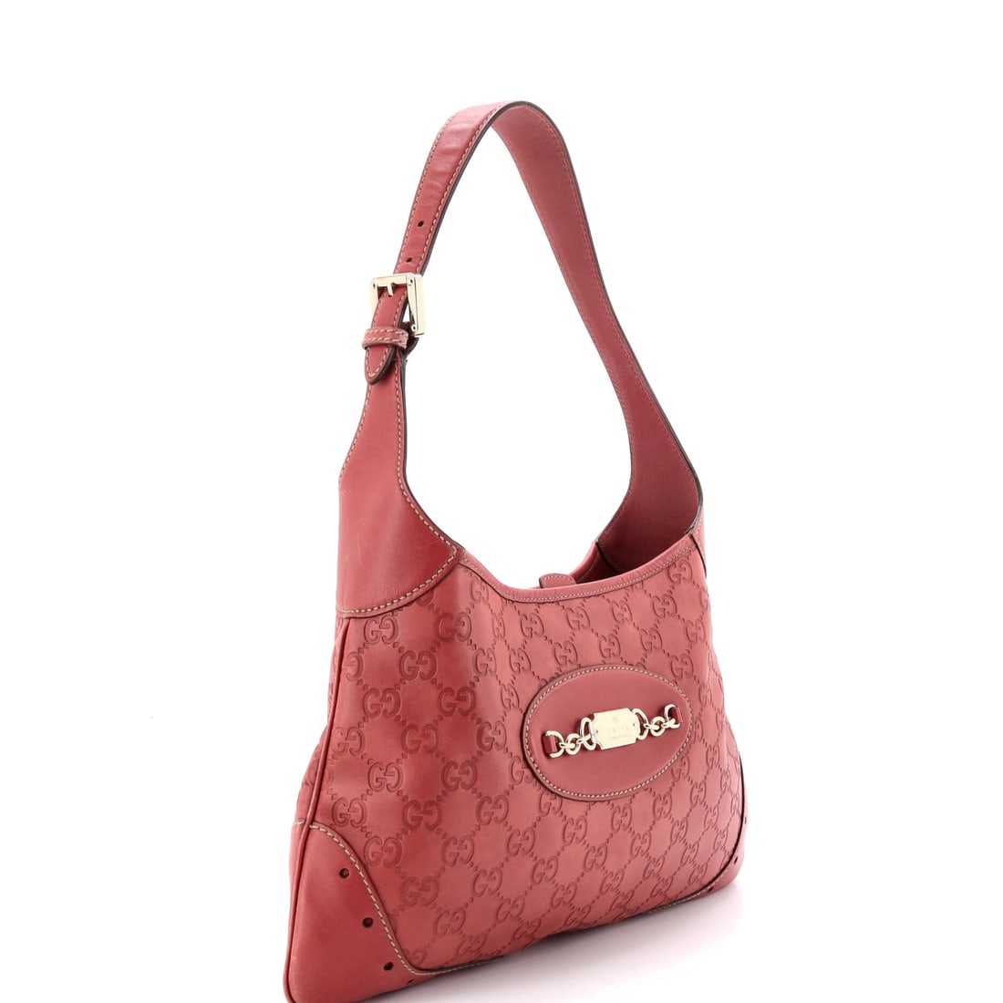 Gucci Punch Hobo Guccissima Leather Medium: Lot 412 belongs on your arm for dinner, then straight to the afters. Offered here as Gucci Gucci Punch Hobo Guccissima Leather Medium, finished in Pink; approx. 13.0 W x 8.0 H; 1.0 D. It has that