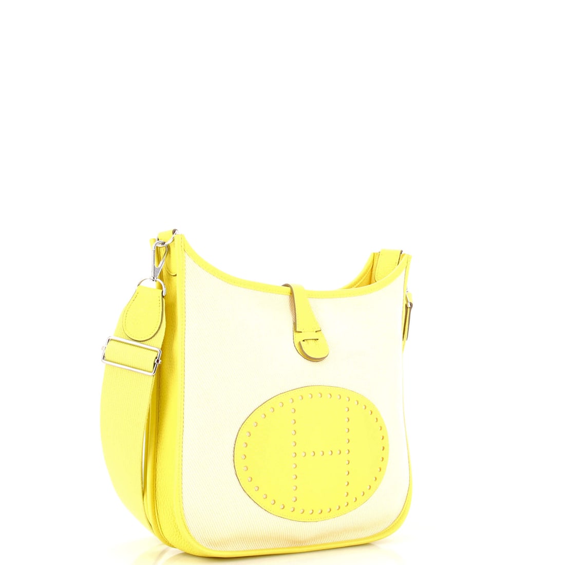 Hermes Evelyne Bag Gen III Toile and Leather PM: Lot 486 reads like a greatest-hit from Hermes's modern archive. Offered here as Hermes Hermes Evelyne Bag Gen III Toile and Leather PM, finished in Yellow; approx. 11.0 W x 11.0 H; 3.0 D. Think of it