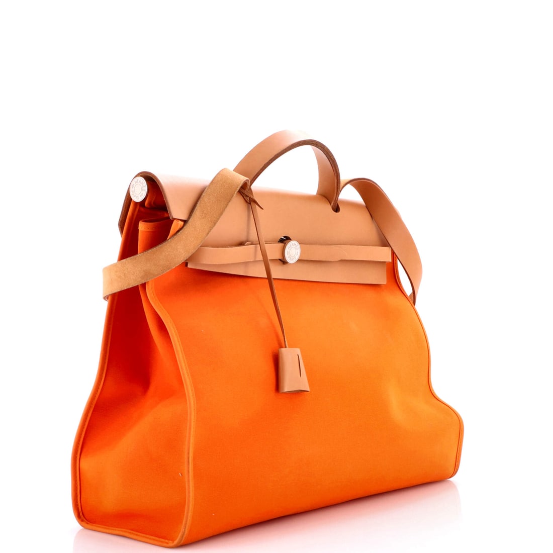 Hermes Herbag Zip Leather and Toile 39: Lot 489 is the kind of piece that makes people ask, 'Where did you find that?'. Offered here as Hermes Hermes Herbag Zip Leather and Toile 39, finished in Orange; approx. 15.0 W x 12.0 H; 5.5 D. A