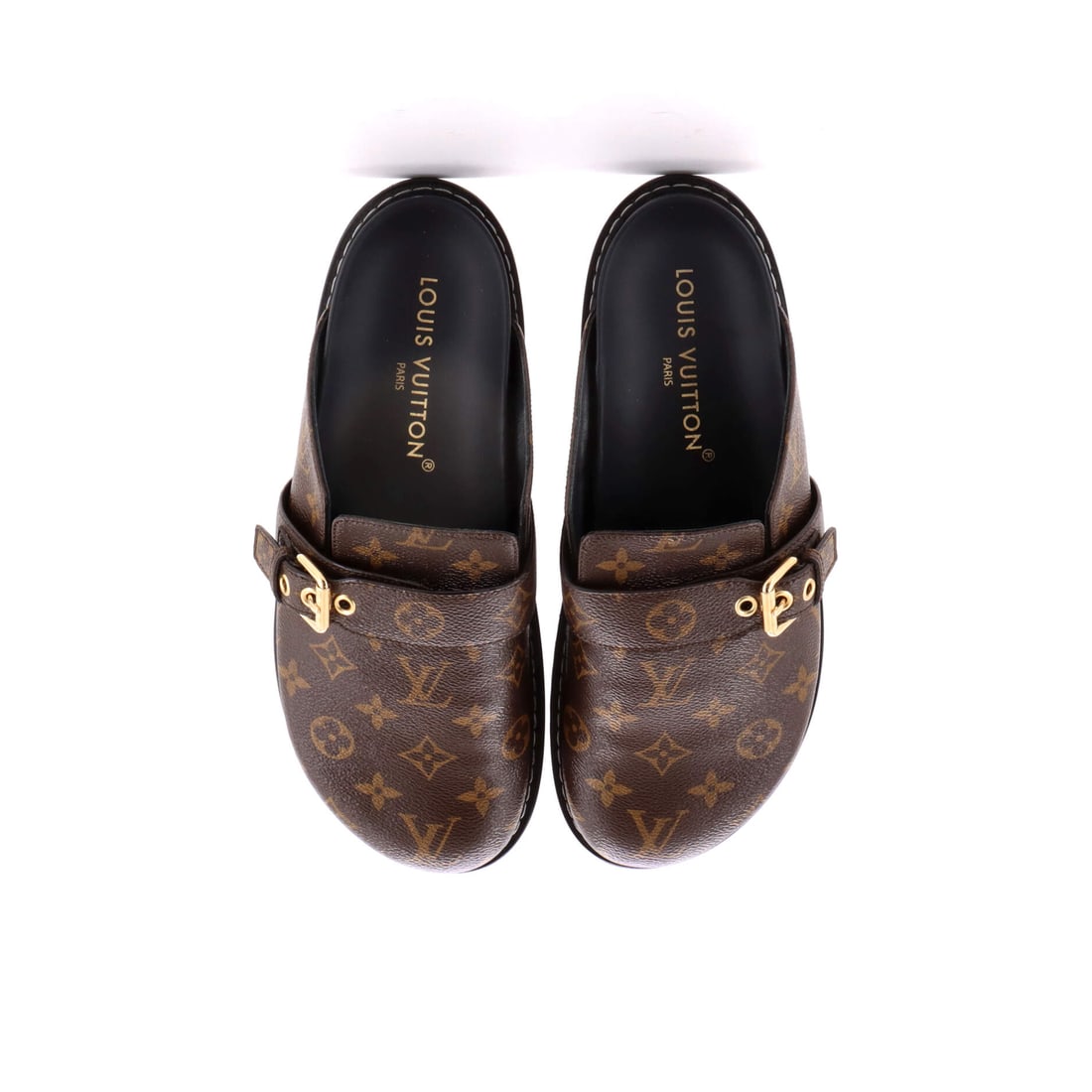 Louis Vuitton Cosy Flat Clog Mules Monogram Canvas and Leather: Lot 638 balances structure and ease with that unmistakable Louis Vuitton point of view. Offered here as Louis Vuitton Louis Vuitton Cosy Flat Clog Mules Monogram Canvas and Leather, finished in
