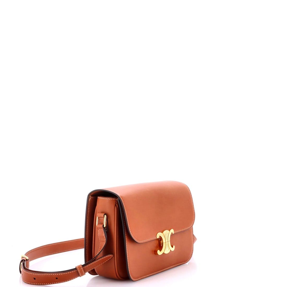 Celine Triomphe Shoulder Bag Smooth Calfskin Medium: Rarely does a shoulder bag reward repeated first glances the way the Celine Triomphe Shoulder Bag Smooth Calfskin Medium in Brown does. In Calfskin, mid-size proportioned, and meticulously constructed