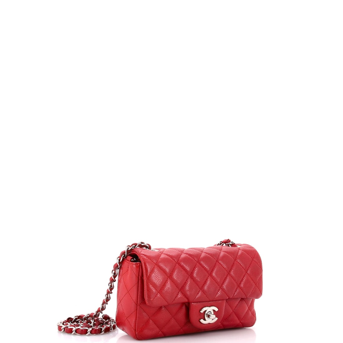 Chanel Classic Single Flap Bag Quilted Caviar Mini: Not every bag earns its reputation. The Chanel Classic Single Flap Bag Quilted Caviar Mini in Red has earned its many times over. Rendered in Caviar, this compact bag commands attention before you eve
