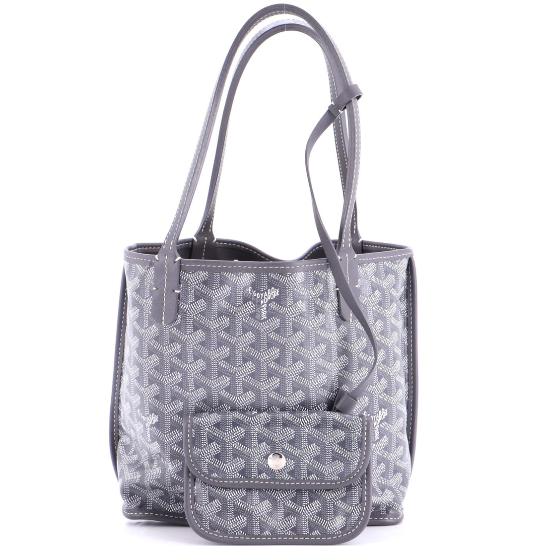 Goyard Anjou Reversible Tote Coated Canvas Mini: Some pieces outlast every trend they ever coincided with. The Goyard Anjou Reversible Tote Coated Canvas Mini, a compact tote in Coated Canvas, Canvas in Gray, is one of them -- an expression of hand-