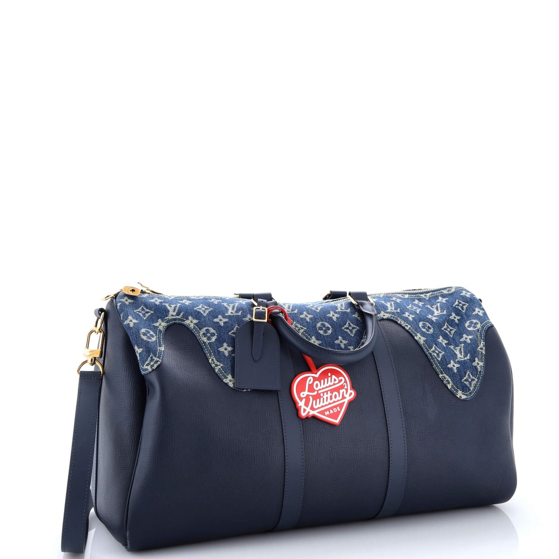 Louis Vuitton Nigo Keepall Bandouliere Bag Monogram Denim and Taurillon Leather 50: Luxe, purposeful, and built to outlast the moment: the Louis Vuitton Nigo Keepall Bandouliere Bag Monogram Denim and Taurillon Leather 50 in Blue arrives as a Denim, Leather bag with the kind of desig