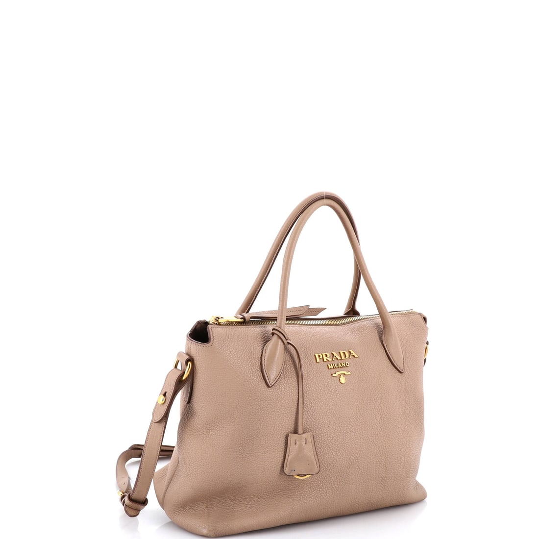 Prada Dual Strap Zip Tote Vitello Daino Medium: Mid-Size fine materials tote deserves to be carried, not kept. The Prada Dual Strap Zip Tote Vitello Daino Medium in Neutral brings the quiet confidence that only genuinely exceptional objects