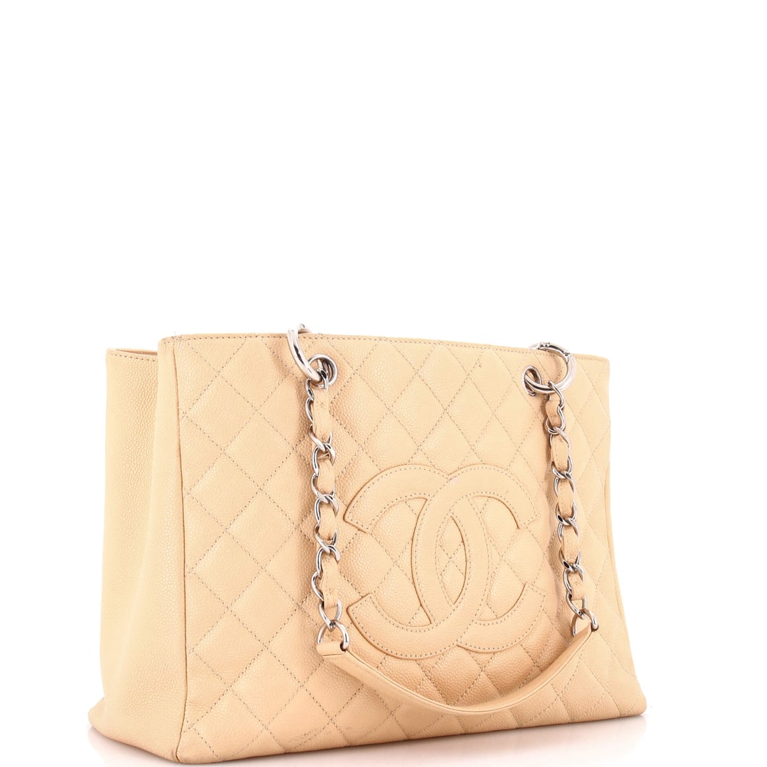 Chanel Grand Shopping Tote Quilted Caviar: Some pieces outlast every trend they ever coincided with. The Chanel Grand Shopping Tote Quilted Caviar, a tote in Caviar in Neutral, is one of them -- an expression of couture precision that compound