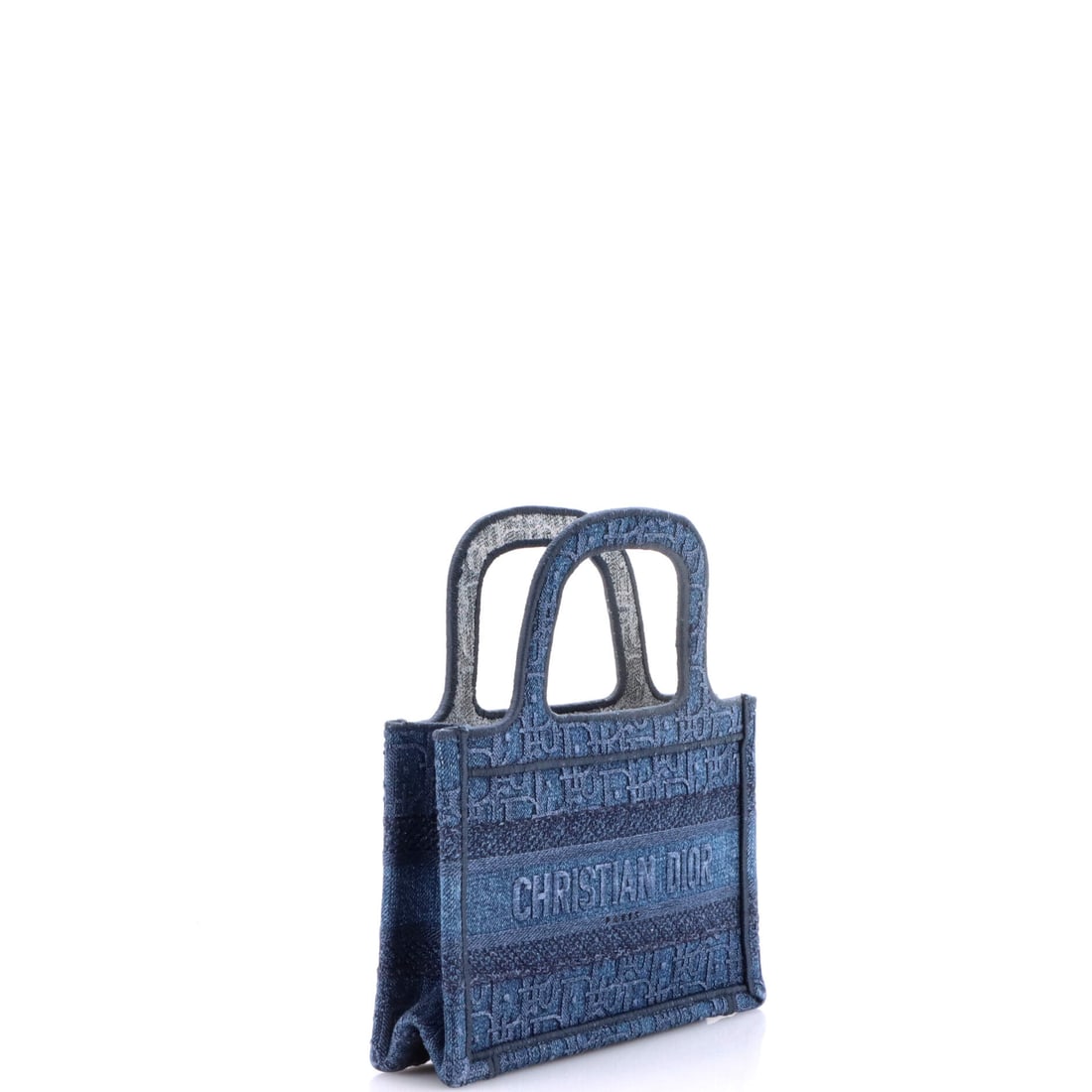 Christian Dior Book Tote Oblique Denim Mini: The edit is straightforward: when in doubt, reach for Christian Dior. The Book Tote Oblique Denim Mini in Blue, a compact tote in Denim, is precisely the kind of acquisition that rewards you every tim