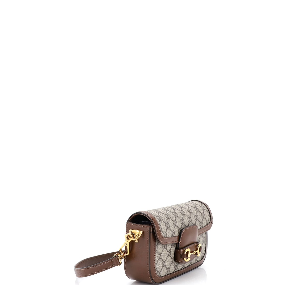 Gucci Horsebit 1955 Shoulder Bag GG Coated Canvas with Leather East West: The Gucci Horsebit 1955 Shoulder Bag GG Coated Canvas with Leather East West: proof that the best things in life reward patience and discernment. This shoulder bag arrives in Brown in Coated Canvas,