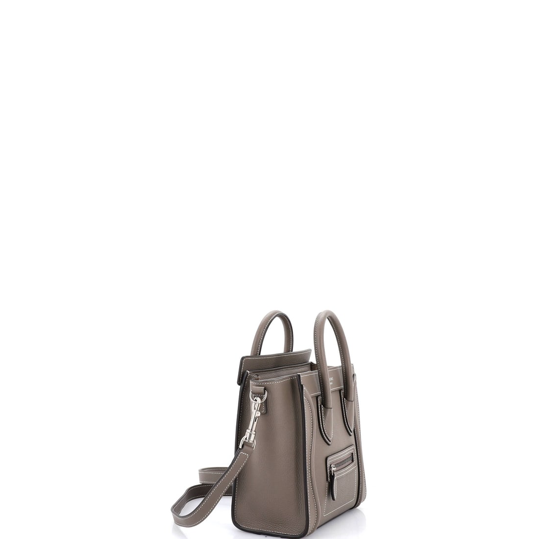Celine Luggage Bag Grainy Leather Nano: Where heritage meets undeniable style. The Celine Luggage Bag Grainy Leather Nano arrives in a striking Gray leather finish (size Nano). At 8" x 7.5" x 4", this piece strikes the ideal balance of capa