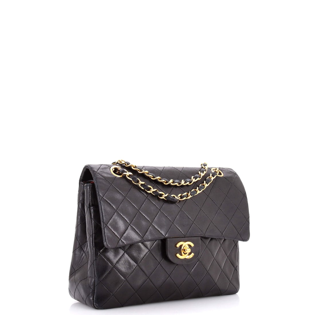 Chanel Vintage Square Classic Double Flap Bag Quilted Leather Medium: The perfect marriage of form and function. This particular Chanel Vintage Square Classic Double Flap Bag Quilted Leather Medium features a Black leather quilted exterior (size Medium). Sized at 8" H,