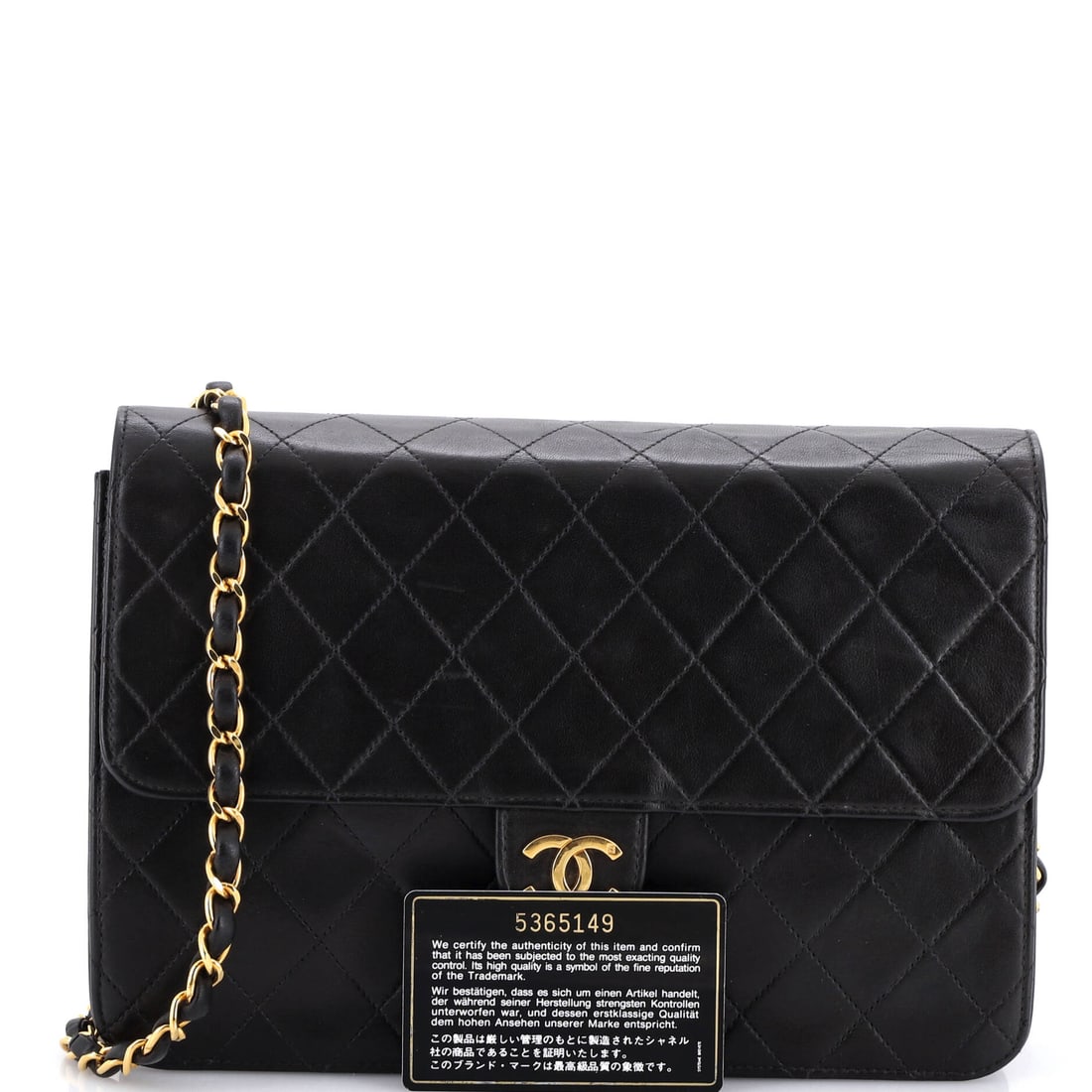 Chanel Vintage Clutch with Chain Quilted Leather Medium: Designed to be noticed, built to be treasured. Meet the Chanel Vintage Clutch with Chain Quilted Leather Medium in Black leather quilted (size Medium) -- as desirable as ever. With dimensions of 7" x
