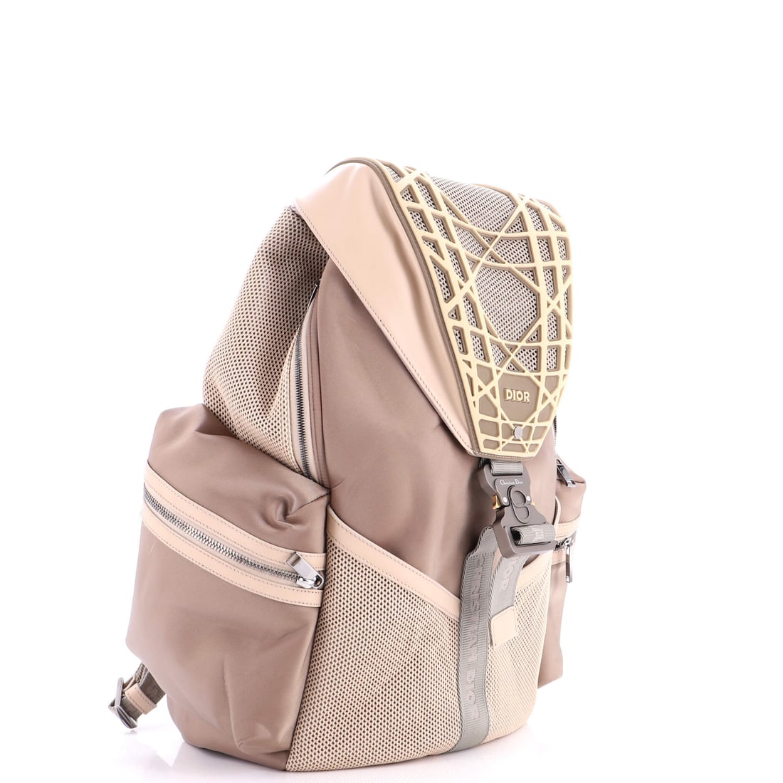 Christian Dior Cobra Backpack Nylon with Rubber and Mesh: Effortless luxury, distilled into one silhouette. The Cobra Backpack Nylon with Rubber and Mesh by Christian Dior in Neutral nylon rubber needs no embellishment.
