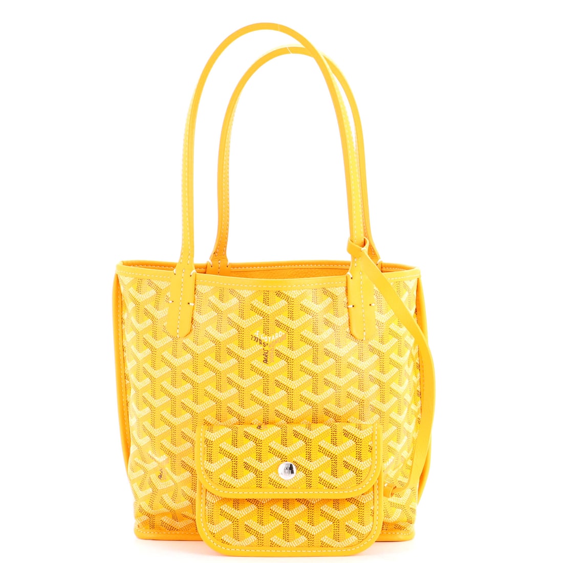Goyard Anjou Reversible Tote Coated Canvas Mini: For those who curate rather than accumulate. The Goyard Anjou Reversible Tote Coated Canvas Mini arrives in a striking Orange canvas coated finish (size Mini). Sized at 8" H, 8" W, and 3.5" D -- just