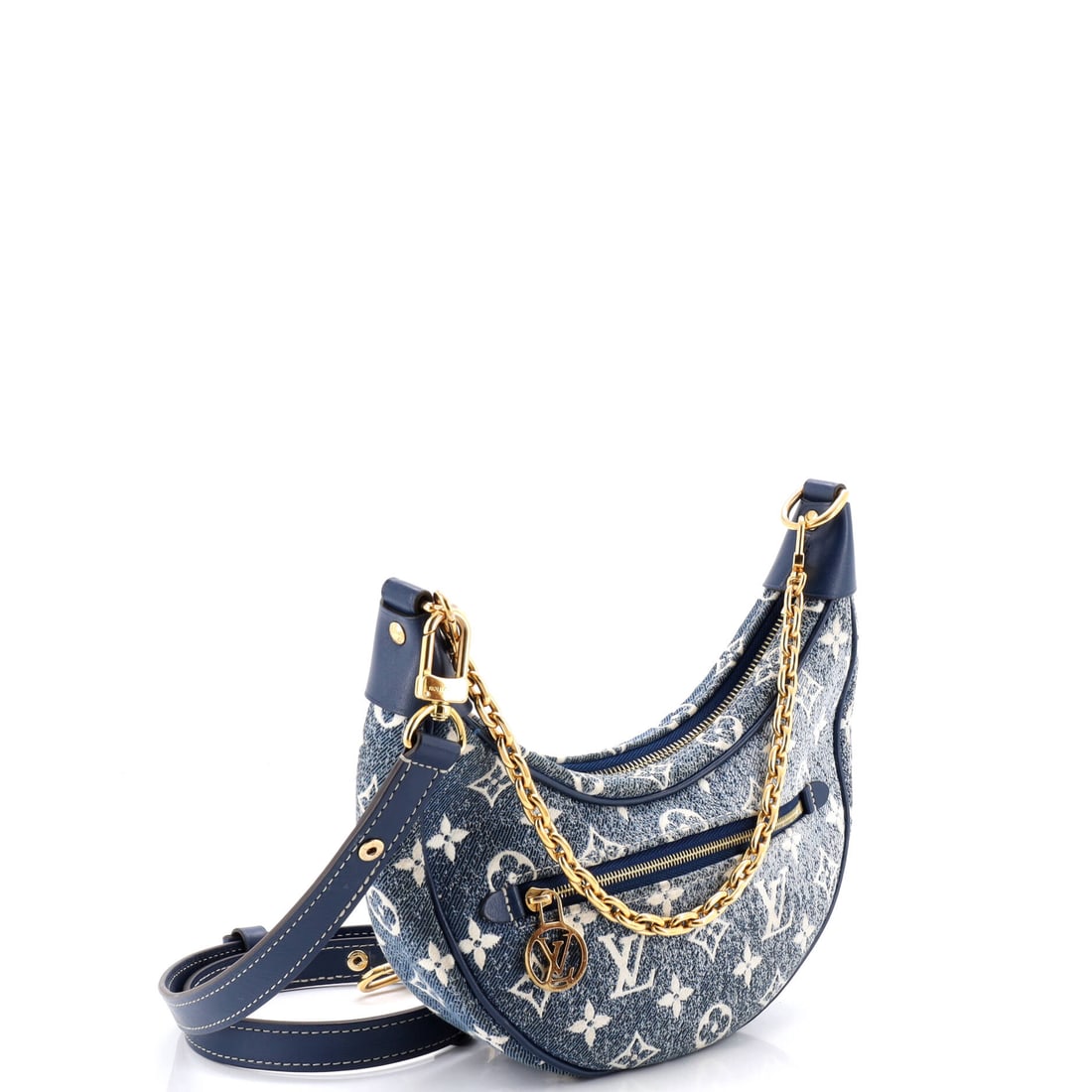 Louis Vuitton Loop Handbag Monogram Jacquard Denim: The perfect marriage of form and function. This Louis Vuitton Loop Handbag Monogram Jacquard Denim in Blue, White denim monogram is a standout from the house's celebrated lineup. With dimensions of 5"