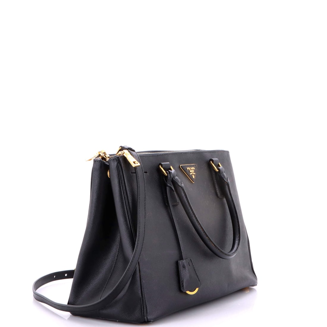 Prada Double Zip Lux Tote Saffiano Leather Medium: For those who believe their arm candy should spark conversation. Meet the Prada Double Zip Lux Tote Saffiano Leather Medium in Black leather (size Medium) -- as desirable as ever. At 9.5" x 13" x 6",