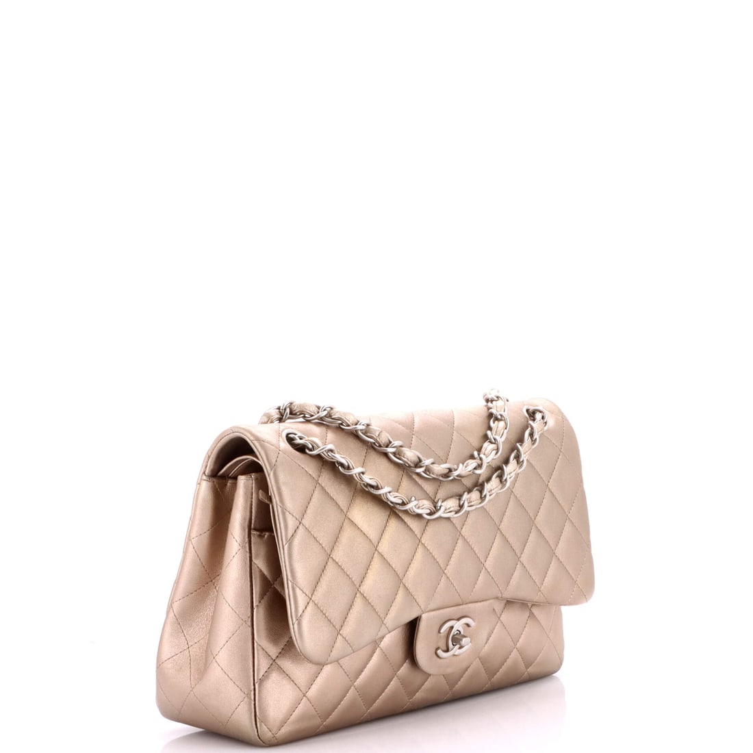 Chanel Classic Double Flap Bag Quilted Lambskin Jumbo: A meditation on form wrapped in the finest materials. There is a quietude to this Classic Double Flap Bag Jumbo that belies the extraordinary craft within. Presented in quilted lambskin construction,