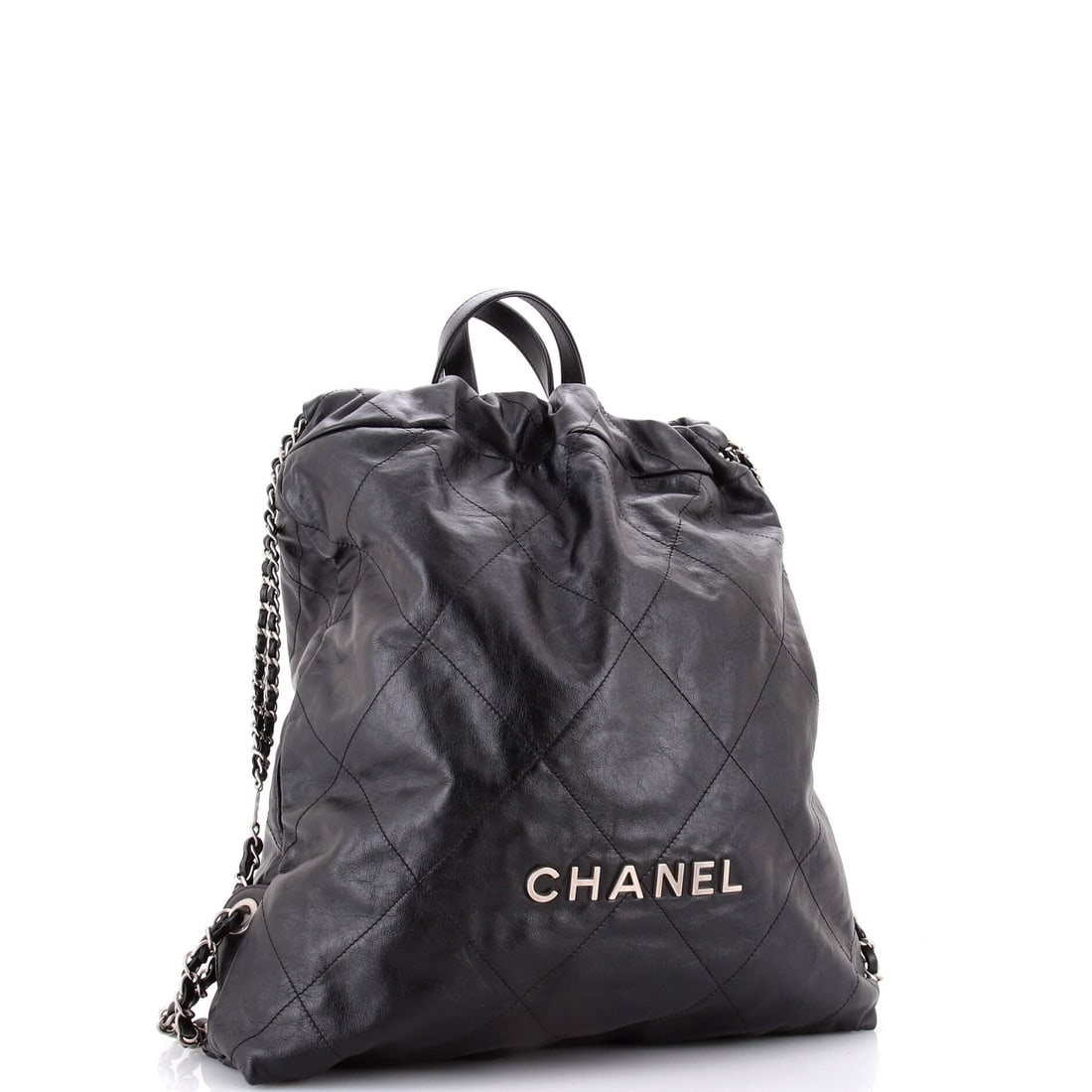 Chanel 22 Chain Backpack Quilted Calfskin Large: The story of this piece begins where mass production ends. Rendered in Calfskin, this Chanel silhouette has anchored collections and turned heads since its debut. Presented in the Large size, calfskin