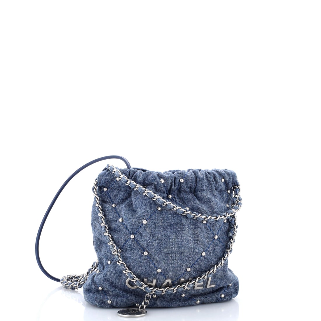 Chanel 22 Chain Hobo Quilted Studded Denim Mini: Born from a tradition that has outlasted every passing trend. This particular 22 Chain Hobo Quilted Studded in Denim captures the essence of what Chanel does best. Presented in the Mini size, denim co