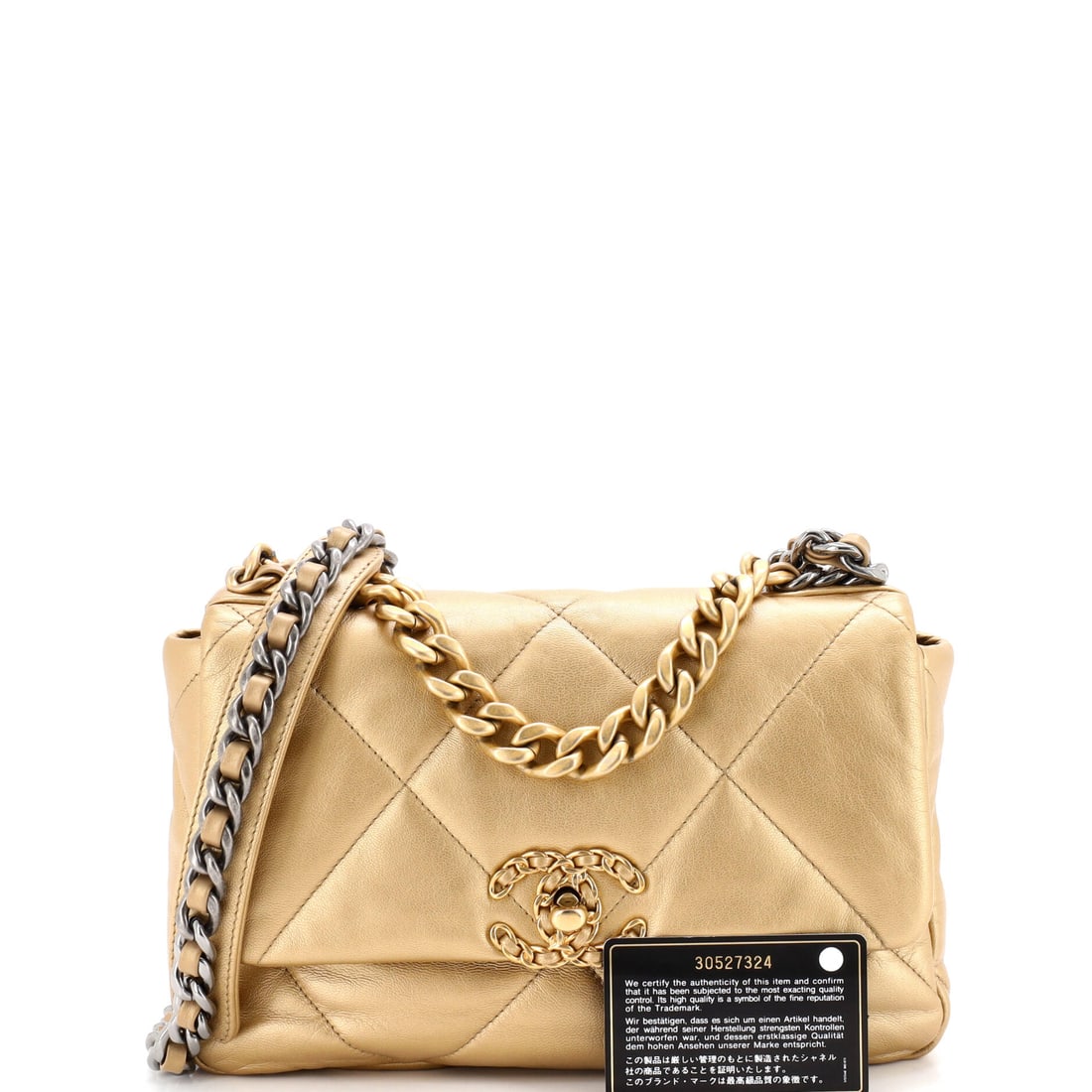 Chanel 19 Flap Bag Quilted Leather Medium: Some things whisper. This one has a megaphone. This Chanel 19 Flap Bag does not follow trends. Trends follow it. Presented in the Medium size, quilted leather construction, a gold colorway. Dimensions
