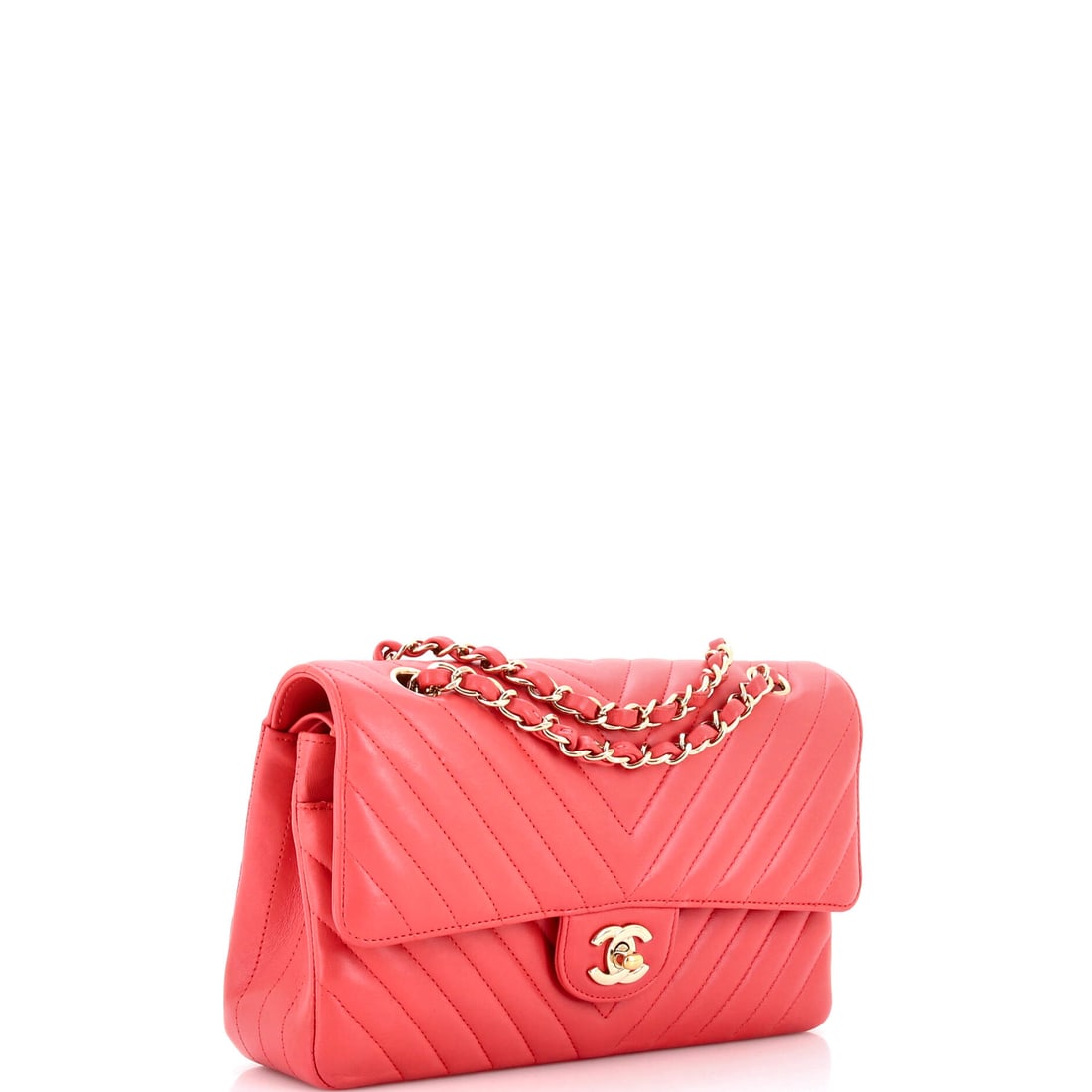 Chanel Classic Double Flap Bag Chevron Lambskin Medium: Some houses built their legend one silhouette at a time. The Classic Double Flap Bag Chevron carries the DNA of Chanel's most celebrated design principles. Presented in the Medium size, lambskin const