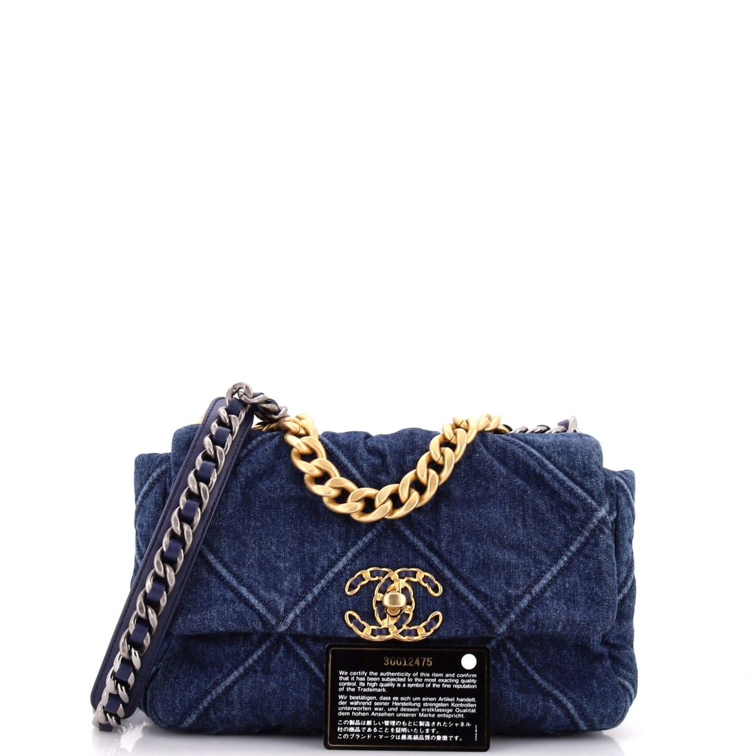 Chanel 19 Flap Bag Quilted Denim Medium: The smallest details carry the heaviest elegance. Light moves differently across Denim, and Chanel knows exactly how to use that. Presented in the Medium size, denim construction, a blue colorway. Mea
